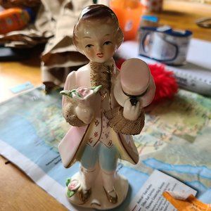 Porcelain figurine , young prince